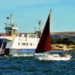 Yacht vs ferry at Sandbanks