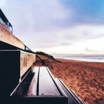 Wooden steps down to Sandbanks Beach