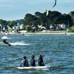 Three girls on a paddleboard