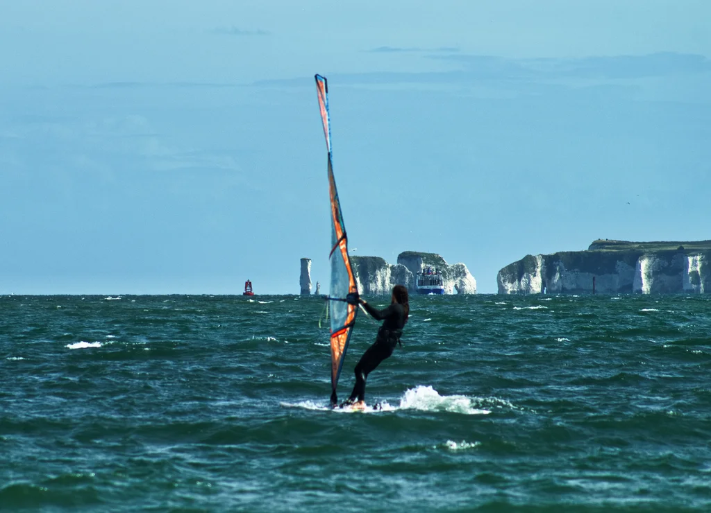 Windsurfer in Sandbanks with Old Harry's Rocks in the background