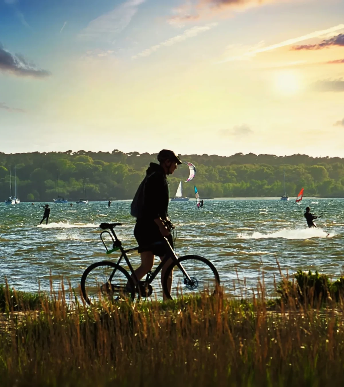 Biker silhouette with Brownsea Island as a backdrop