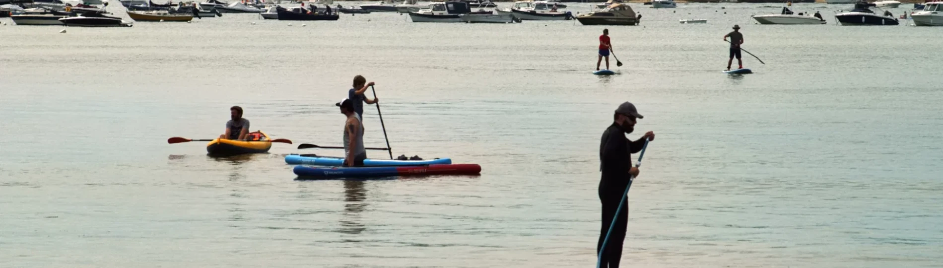 Paddle Boarding on still waters at Sandbanks