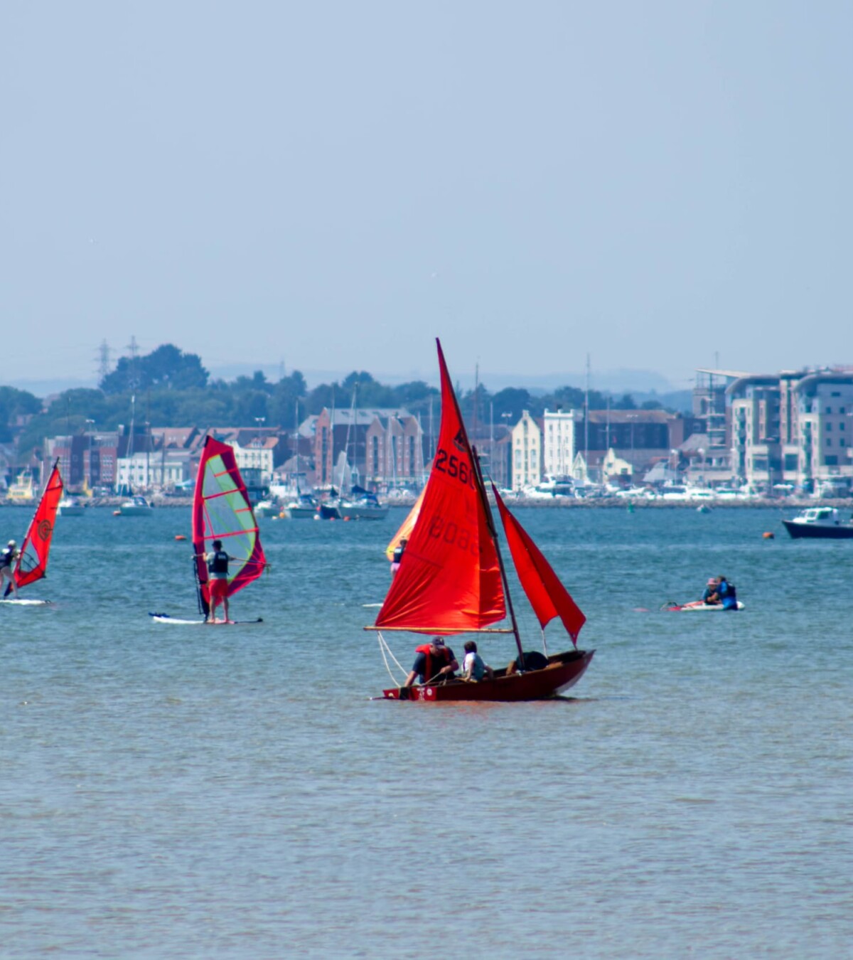 Little Red Boats on the Bay